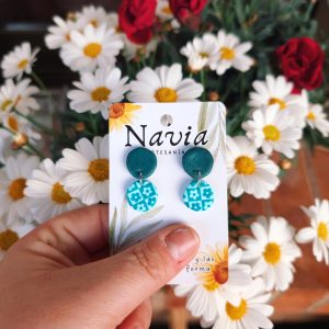 Flor cuadrada turquesa pequeña